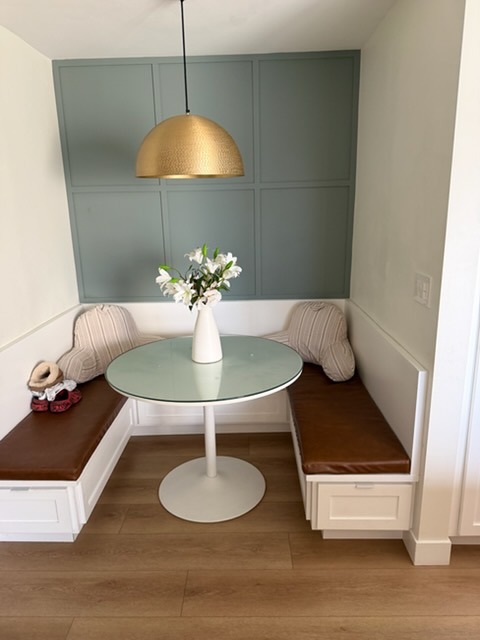 Styled breakfast nook in Scripps Ranch home with teal accent wall after cleaning
