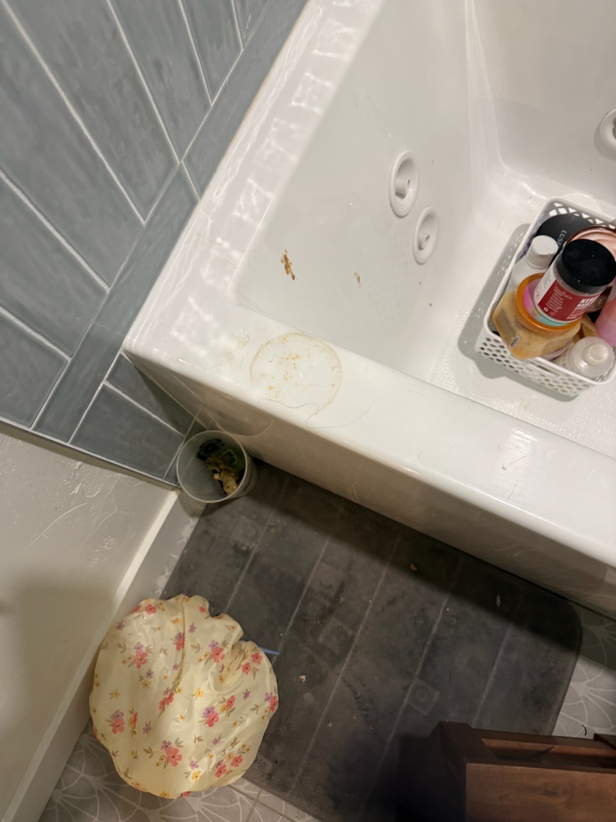 Jetted bathtub and tile floor in Scripps Ranch bathroom before deep cleaning